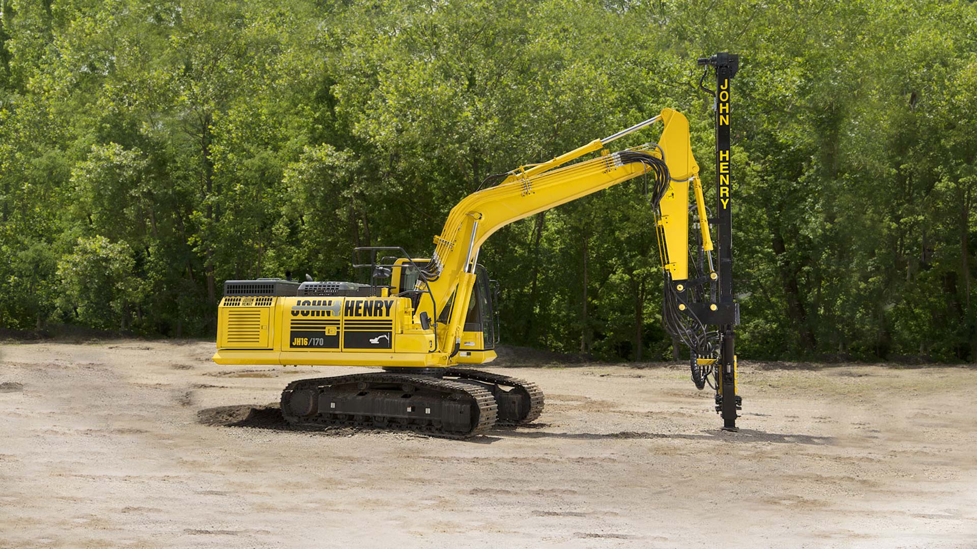 Excavator mounted rock drill john henry drilling